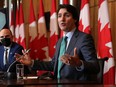 Prime Minister Justin Trudeau is accompanied by Health Minister Jean-Yves Duclos at a press conference in Ottawa on Jan. 5, 2022. A reader says politicians on both the right and the left need to tone down the rhetoric.