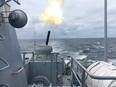 A view shows a warship of the Russian Navy during artillery fire drills in the Baltic Sea, in this still image taken from video released Jan. 27, 2022.