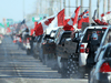 People rally in support of truckers and against COVID vaccine mandates, January 25. 2022 in Winnipeg.