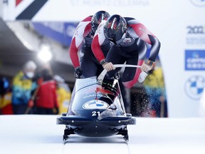 Bob & Skeleton World Cup and IBSF European Championships - Saint-Moritz, Switzerland - January 15, 2022

Canada's Justin Kripps and Cam Stones in action during the Men's Two-Man Bobsleigh REUTERS/Arnd Wiegmann