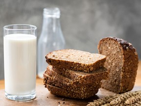While grocers are being punished for fixing prices for bread in Canada, the federal government violated a trade agreement to open the Canadian market to more American dairy products.