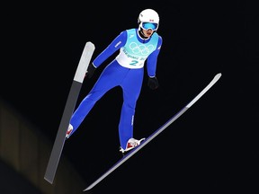 Matthew Soukup of Team Canada jumps during Mixed Team Ski Jumping First Round at National Ski Jumping Centre on February 07, 2022 in Zhangjiakou, China