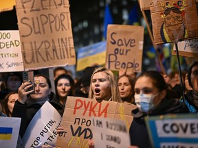 Ukrainians demonstrate in Whitehall outside of Downing Street the residence of the UK Prime Minister Boris Johnson on February 25, 2022 in London, England.