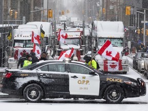 Die Proteste gegen das Impfmandat gehen am Samstag, den 12. Februar 2022 in der Innenstadt von Ottawa weiter.