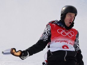 Shaun White of the United States reacts after his second run.