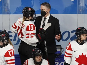 Canada coach Troy Ryan talks to Sarah Fillier of Canada. REUTERS/David W Cerny