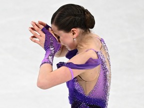 Russia's Kamila Valieva reacts after competing in the women's single skating short program of the figure skating event during the Beijing 2022 Winter Olympic Games on Feb. 15, 2022.