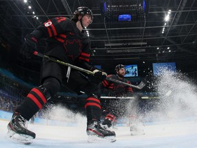 Canada's Owen Power during the men's qualification play-off match of the Beijing 2022 Winter Olympic Games ice hockey competition against China, at the National Indoor Stadium in Beijing on February 15, 2022.