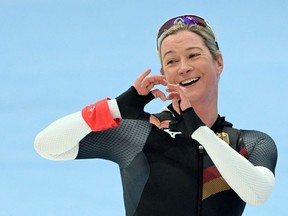 Claudia Pechstein gestures after competing in the women's speedskating 3000m event on Feb. 5, 2022.
