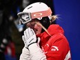Canada's Justine Dufour-Lapointe reacts after her run in the freestyle skiing women's moguls final during the Beijing 2022 Winter Olympic Games.
