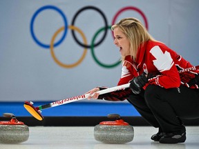 Canada's Jennifer Jones shouts during the women's round robin session 2 game of the Beijing 2022 Winter Olympic Games curling competition between Canada and South Korea, at the National Aquatics Centre in Beijing on February 10, 2022.