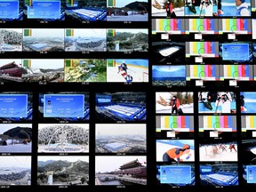 A picture shows screens in a Master Control Room (MCR) of the Olympic Broadcasting Services (OBS) in International Broadcast Centre (IBC) in Beijing on February 11, 2022 during the Beijing 2022 Olympic Games.