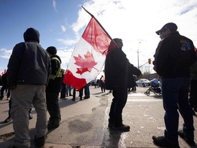 Protestors block the roadway at the Ambassador Bridge border crossing, in Windsor, Ontario on February 9, 2022.