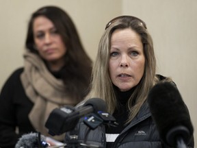 Tamara Lich, organizer for a protest convoy by truckers and supporters demanding an end to COVID-19 vaccine mandates, delivers a statement during a news conference in Ottawa, Thursday, Feb. 3, 2022.