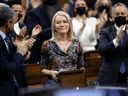 Conservative MPs applaud the party's new interim leader Candice Bergen in the House of Commons on February 3, 2022.