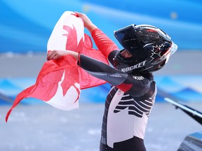 Christine de Bruin of Team Canada celebrates during the Women's Monobob Bobsleigh Heat 4 on day 10 of Beijing 2022 Winter Olympic Games.