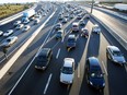 Cars and trucks mass at Highway 401 and Islington.