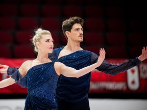 Piper Gilles, left, of Toronto and Paul Poirier of Unionville, Ont., perform their free dance on the way to winning the Canadian ice dance skating title at the Canadian Tire Skating Championships at TD Place arena in Ottawa on Saturday, Jan. 8, 2022.