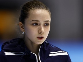 Kamila Valieva of the Russian Olympic Committee looks on during training.