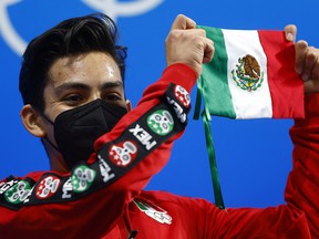 Donovan Carrillo of Mexico in action in the men's figure skating at the Olympics.