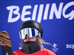Canada's Olivia Asselin waits for her score as she competes in the freestyle skiing women's freeski slopestyle final run during the Beijing 2022 Winter Olympic Games.