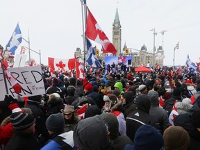 Protesters gather near Ottawa's Parliament Hill, on February 12, 2022. REUTERS/Lars Hagberg