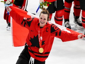 Team Canada captain Marie-Philip Poulin celebrates the team’s gold medal win in women’s hockey at the Beijing 2022 Winter Olympics on Thursday, February 17, 2022.