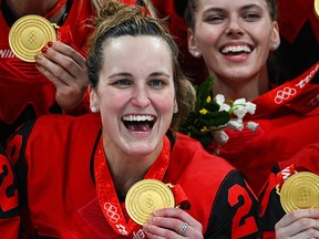 Canada's Marie-Philip Poulin celebrates during the victory ceremony of the women's ice hockey competition during the Beijing 2022 Winter Olympic Games.