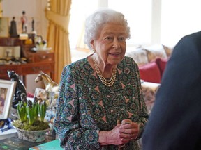 Britain's Queen Elizabeth speaks during an audience where she met the incoming and outgoing Defence Service Secretaries at Windsor Castle in Windsor, Britain, Feb. 16, 2022.