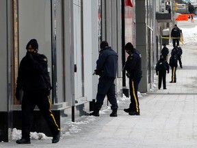 Police investigate after a security alert forced the Rideau Centre shopping mall to be evacuated, days after the downtown was cleared of truckers and supporters who had been protesting against coronavirus disease (COVID-19) mandates in Ottawa, Ontario, Canada February 22, 2022.