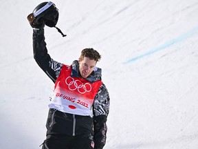 Shaun White of the United States gestures after his run in the Men's Snowboard Halfpipe Final during the Beijing 2022 Olympic Winter Games.