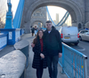 The couple in front of Tower Bridge in London.