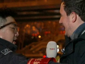 Sjoerd den Daas was reporting to his Dutch broadcaster when a Chinese official attempted to prevent him doing so.