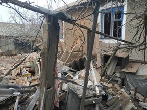 A view shows a residential building, which according to Ukraine's local officials was damaged by shelling, in the town of Vrubivka, in the Luhansk region, Ukraine, in this handout picture released February 17, 2022.