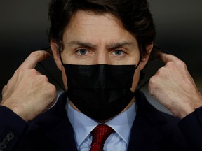 Prime Minister Justin Trudeau attends a news conference in Ottawa on Feb. 24, 2022. The Canadian Constitution Foundation is taking the Trudeau government to court over its invocation of the Emergencies Act.