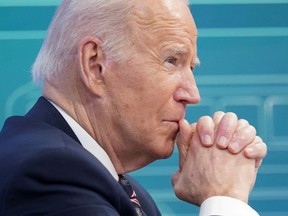 U.S. President Joe Biden, shown at the White House in Washington on February 22, 2022, said Washington would coordinate with NATO allies "to ensure a strong, united response that deters any aggression against the alliance."