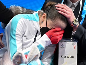 Russia's Kamila Valieva reacts after competing in the women's free skating of the figure skating event during the Beijing 2022 Winter Olympics.