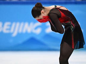 Russia's Kamila Valieva reacts after competing in the women's single skating free skating of the figure skating event during the Beijing 2022 Winter Olympic Games.