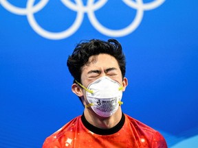 USA's Nathan Chen reacts after competing in the men's single skating free skating of the figure skating event during the Beijing 2022 Winter Olympic Games at the Capital Indoor Stadium in Beijing on February 10, 2022. (Photo by WANG Zhao / AFP)