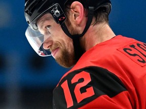 Canada's Eric Staal reacts during the men's preliminary round group A match of the Beijing 2022 Winter Olympic Games ice hockey competition between Canada and USA, at the National Indoor Stadium in Beijing on February 12, 2022. (Photo by Kirill KUDRYAVTSEV / AFP)