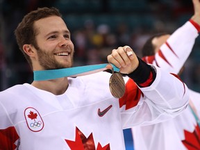 Bronze medal winner Cody Goloubef of Canada celebrates after defeating Czech Republic 6-4 in men's Olympic hockey in 2018.