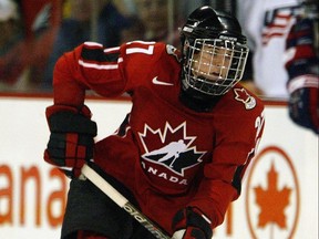 Gina Kingsbury skates with the puck against the USA during the IIHF Women's World Championship Gold Medal game in April, 2007.