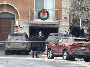 Police investigate after a Domenic Macri, a man with ties to the Montreal Mafia, was shot dead in a garage in LaSalle.