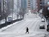 A mostly deserted street in Montreal during a Quebec-wide COVID lockdown, January 10, 2021.