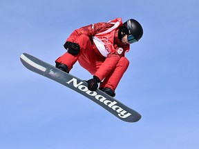 Canada's Max Parrot competes in the snowboard men's slopestyle final run during the Beijing 2022 Winter Olympic Games.