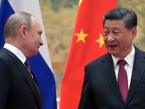 Russian President Vladimir Putin attends a meeting with Chinese President Xi Jinping in Beijing, China February 4, 2022.