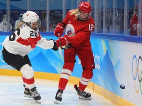 Head coach Yevgeny Bobariko told the agency that Pechnikova, right, did not have symptoms and was taken to an isolation hotel, two days after another player, Polina Bolgareva, also tested positive.