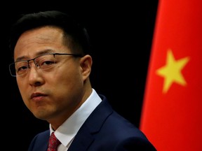 Chinese Foreign Ministry spokesman Zhao Lijian, shown in Beijing, April 2020, says the U.S. should disclose 'which viruses are stored and what research has been conducted' at the alleged biolabs it is operating in Ukraine.