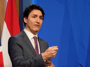 Prime Minster Justin Trudeau speaks at a joint press conference attended by British Prime Minister Boris Johnson and Netherlands Prime Minister Mark Rutte, at Downing Street in London on March 7.