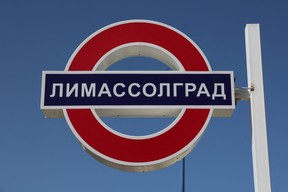 A sign in Cyrillic reads “LimassolGrad” in the Cypriot seaside town of Limassol, heavily favoured by Russians.